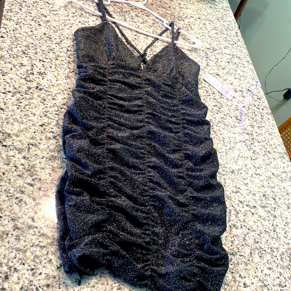 Never worn brand new wrong size beautiful going out with the girls dress.